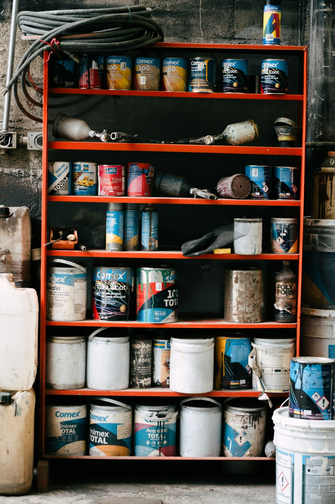 Auto parts warehouse with shelves of car body parts