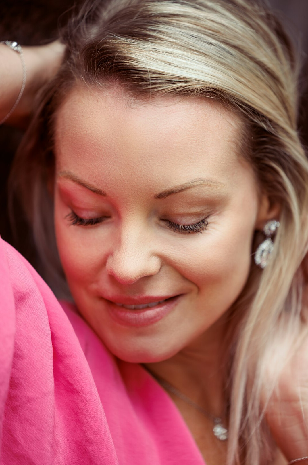 Portrait of a smiling woman with light hair